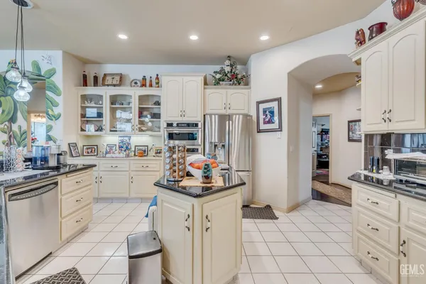 a bed room with a bed and a fireplace