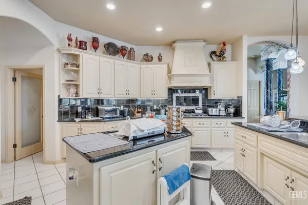 a bedroom with furniture and a bed