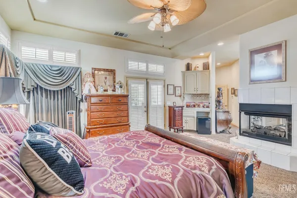 a view of a workspace with furniture and a kitchen