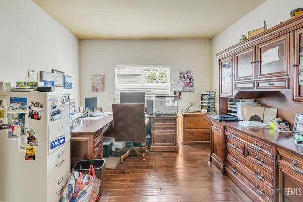 a bathroom with a toilet sink and shower