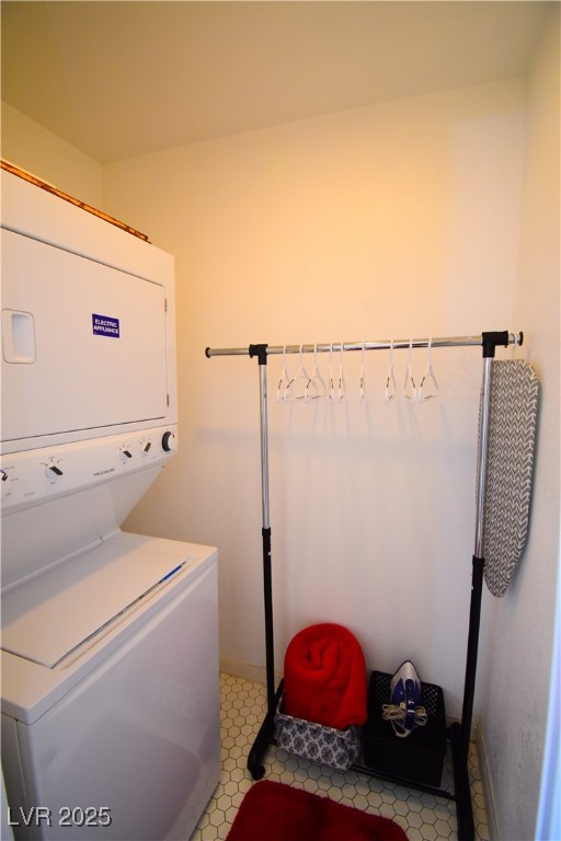 308 North 10th Street, Unit B Las Vegas, NV 89101 - Photo 14 of 17 Washroom featuring stacked washer / dryer and base