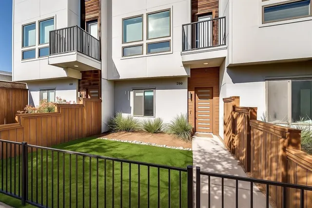 a balcony view with a outdoor seating space
