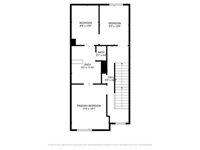 a view of a house with a fence