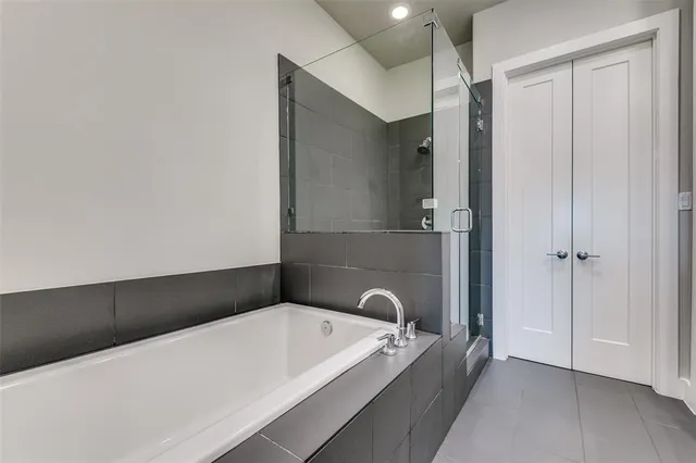 an empty room with a empty space and windows