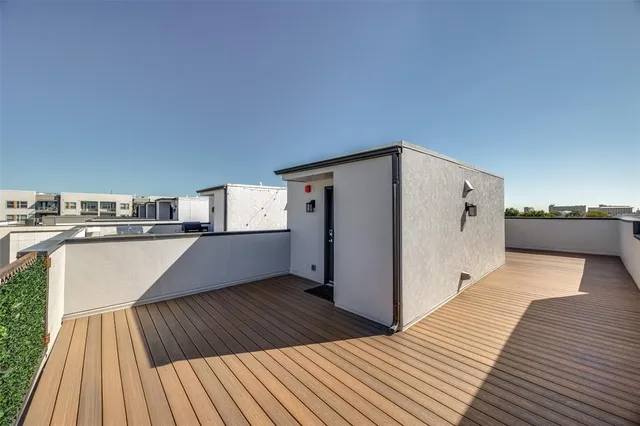a spacious bathroom with a granite countertop tub sink shower and mirror