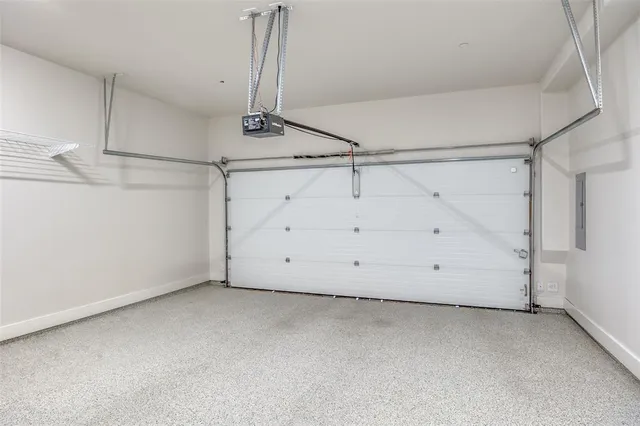 a picture of a bench in front of a wall