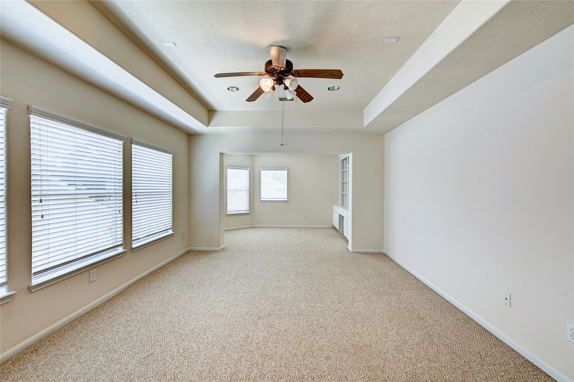24818 Corbin Gate Drive Spring, TX 77389 - Photo 29 of 49 a view of a livingroom with a ceiling fan and window