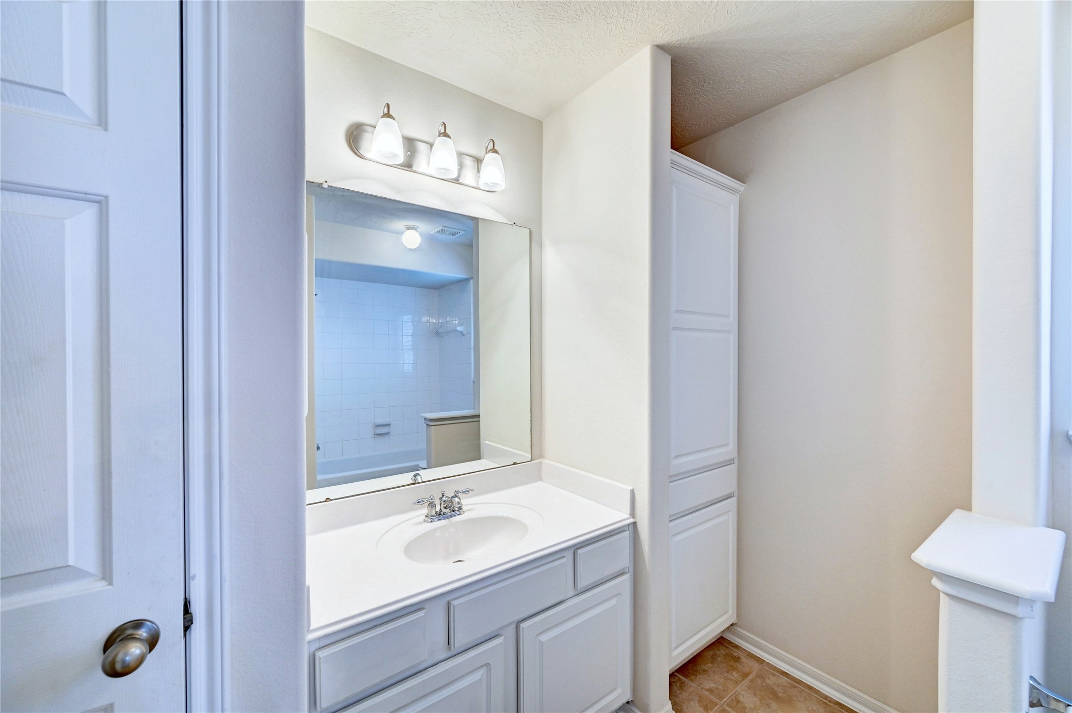 24818 Corbin Gate Drive Spring, TX 77389 - Photo 32 of 49 a bathroom with a sink a toilet and a mirror