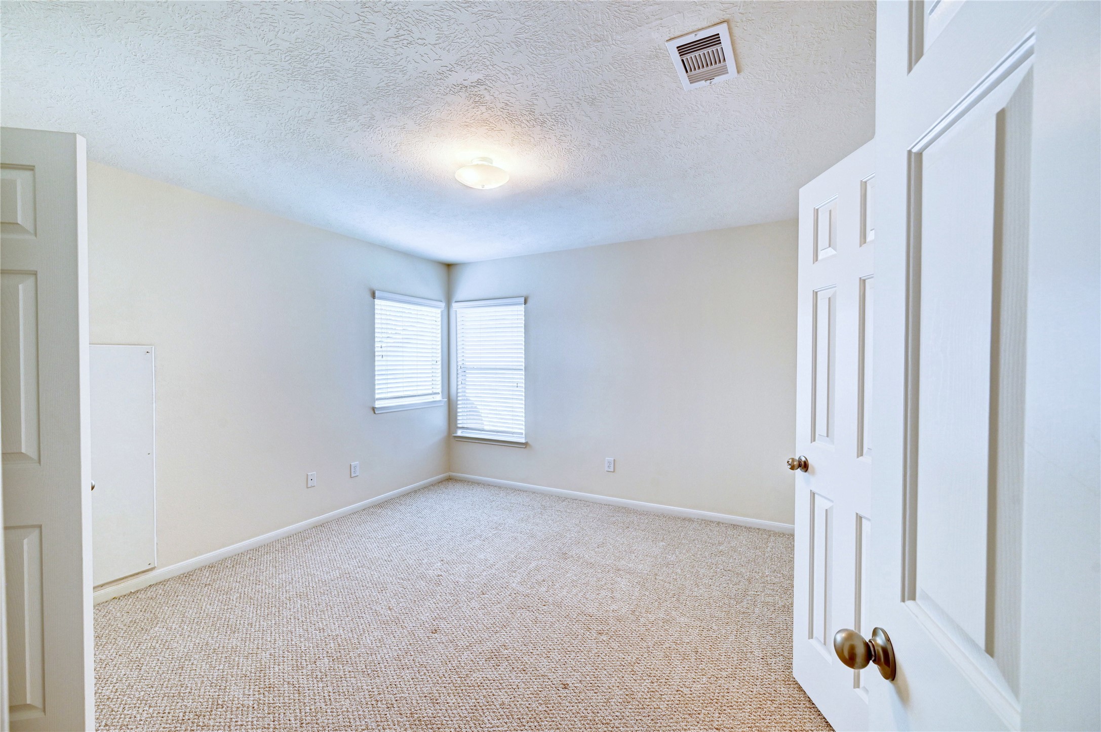 24818 Corbin Gate Drive Spring, TX 77389 - Photo 36 of 49 an empty room with windows