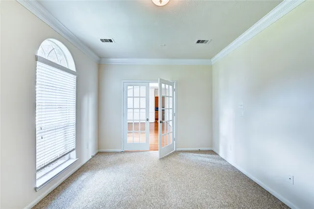 an empty room with windows