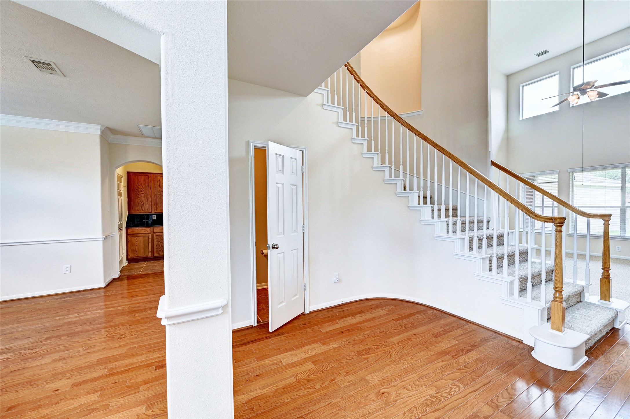 24818 Corbin Gate Drive Spring, TX 77389 - Photo 9 of 49 a view of entryway and hall with wooden floor