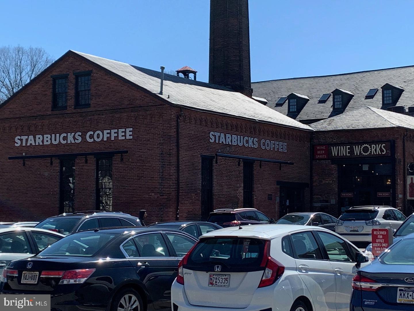 1316 Asbury Road Baltimore, MD 21209 - Photo 29 of 33 Starbucks and Wine Works