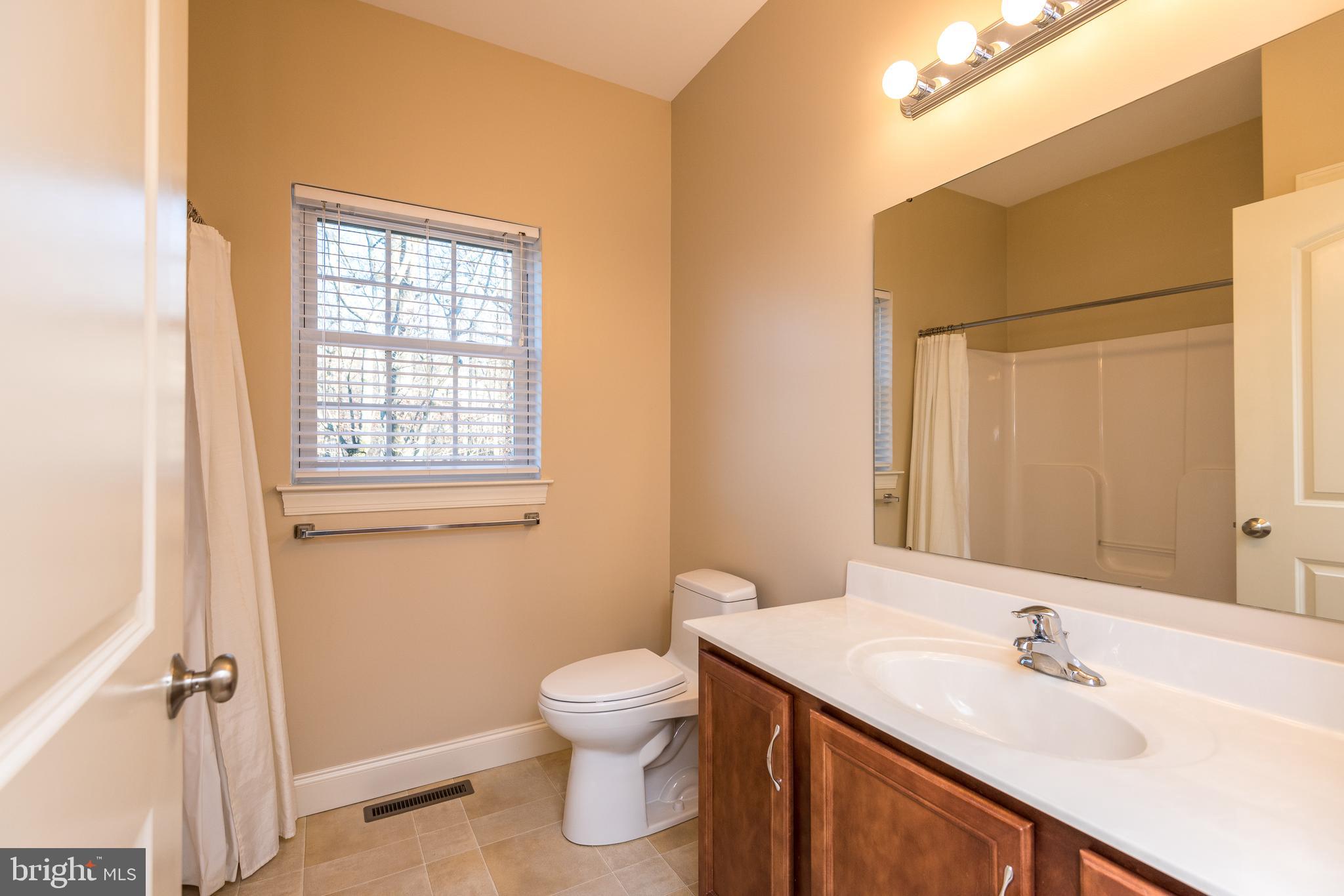 309 Quaker Hill Road Morgantown, PA 19543 - Photo 32 of 43 Guest Bathroom