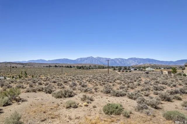 a view of lake and mountain