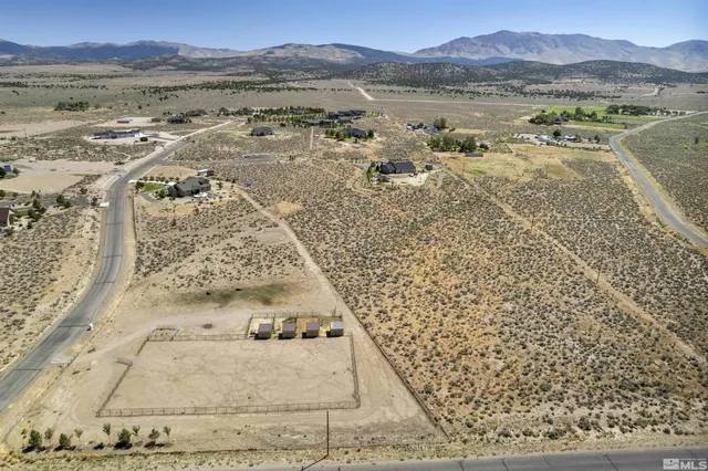 a view of an ocean and mountain