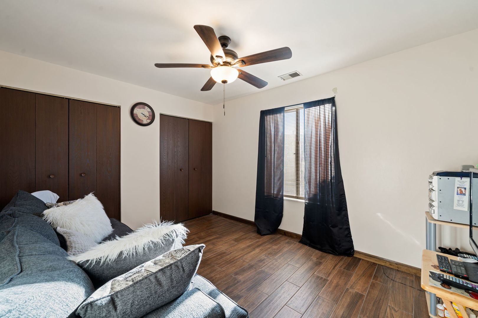 756 Rodenburg Road, Unit 1C Roselle, IL 60172 - Photo 13 of 28 a living room with furniture and a window
