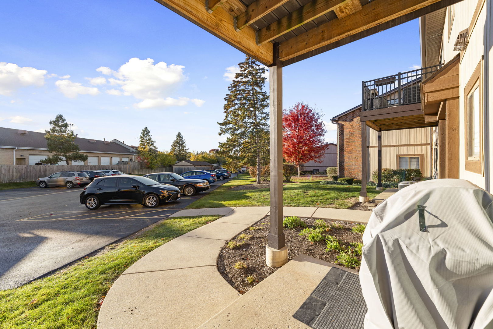 756 Rodenburg Road, Unit 1C Roselle, IL 60172 - Photo 22 of 28 a view of a street with cars