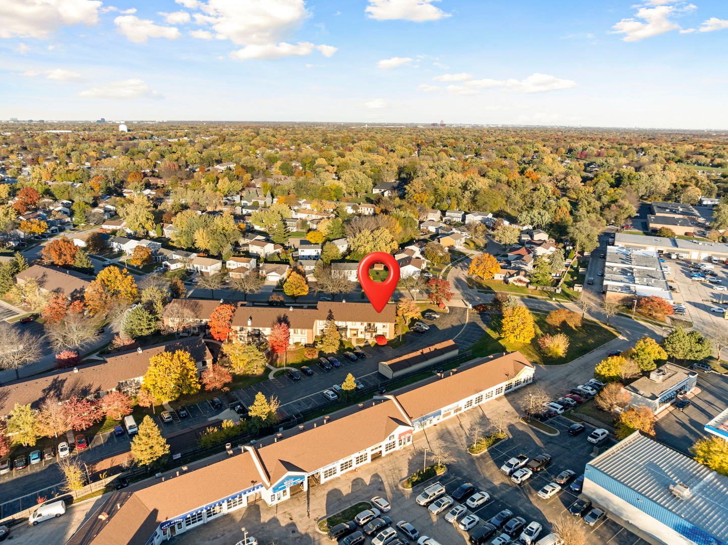 756 Rodenburg Road, Unit 1C Roselle, IL 60172 - Photo 25 of 28 an aerial view of residential houses with outdoor space
