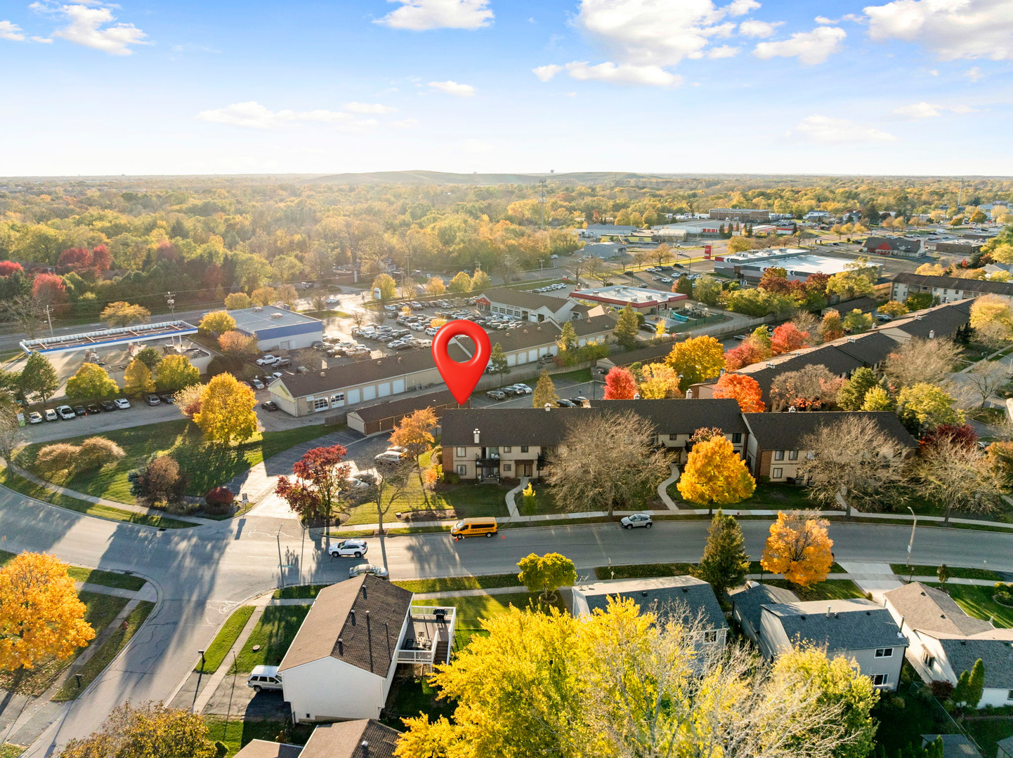 756 Rodenburg Road, Unit 1C Roselle, IL 60172 - Photo 26 of 28 an aerial view of residential houses with outdoor space