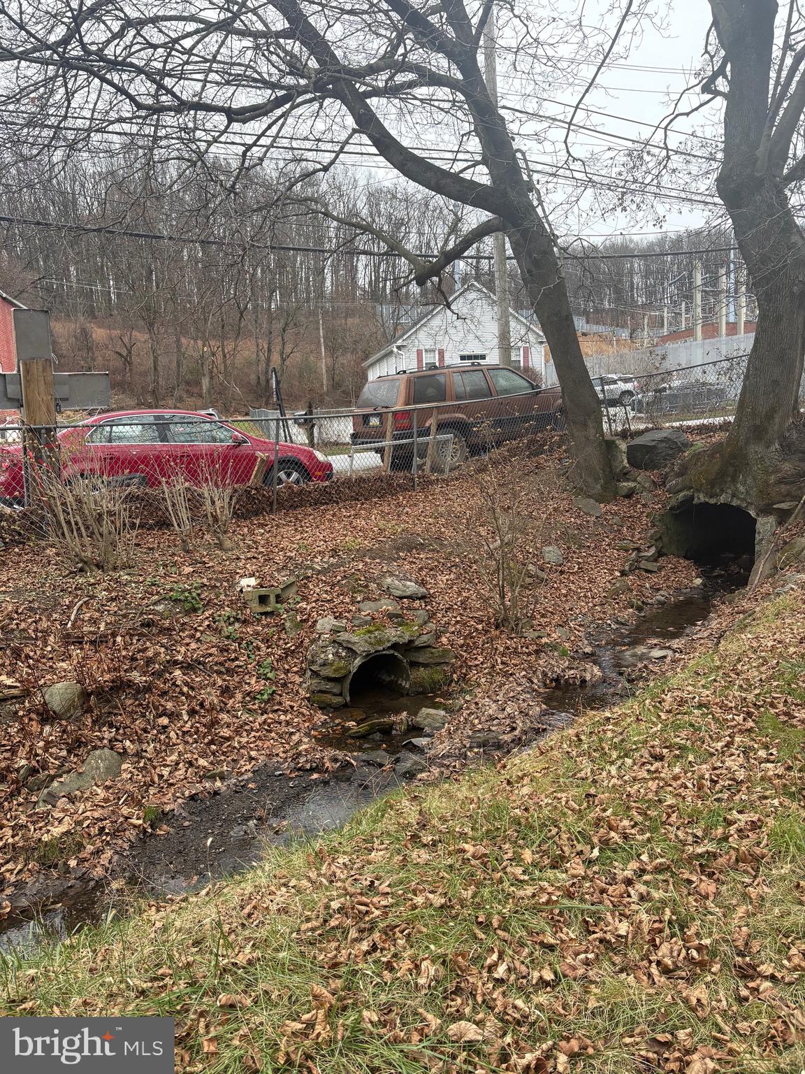 120 Doe Run Road Coatesville, PA 19320 - Photo 17 of 24 a backyard of a house with table and chairs