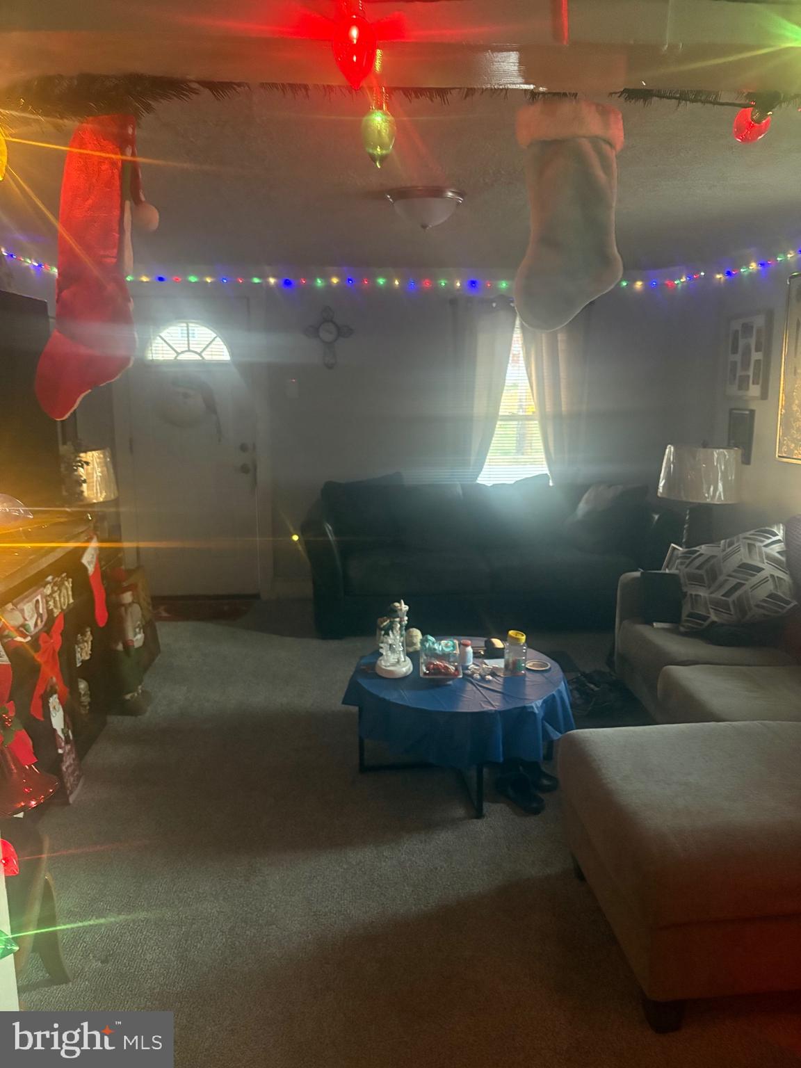 120 Doe Run Road Coatesville, PA 19320 - Photo 20 of 24 a living room with furniture and flowers