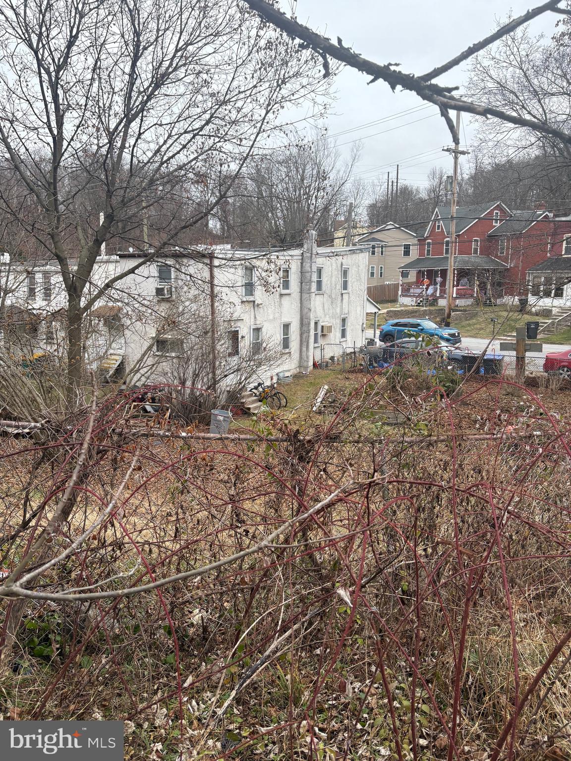 120 Doe Run Road Coatesville, PA 19320 - Photo 2 of 24 a view of a dry yard with wooden fence