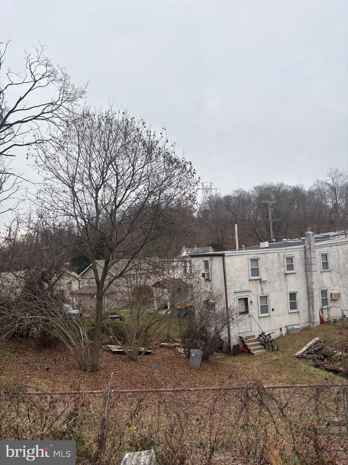 120 Doe Run Road Coatesville, PA 19320 - Photo 3 of 24 a view of a dry yard with trees