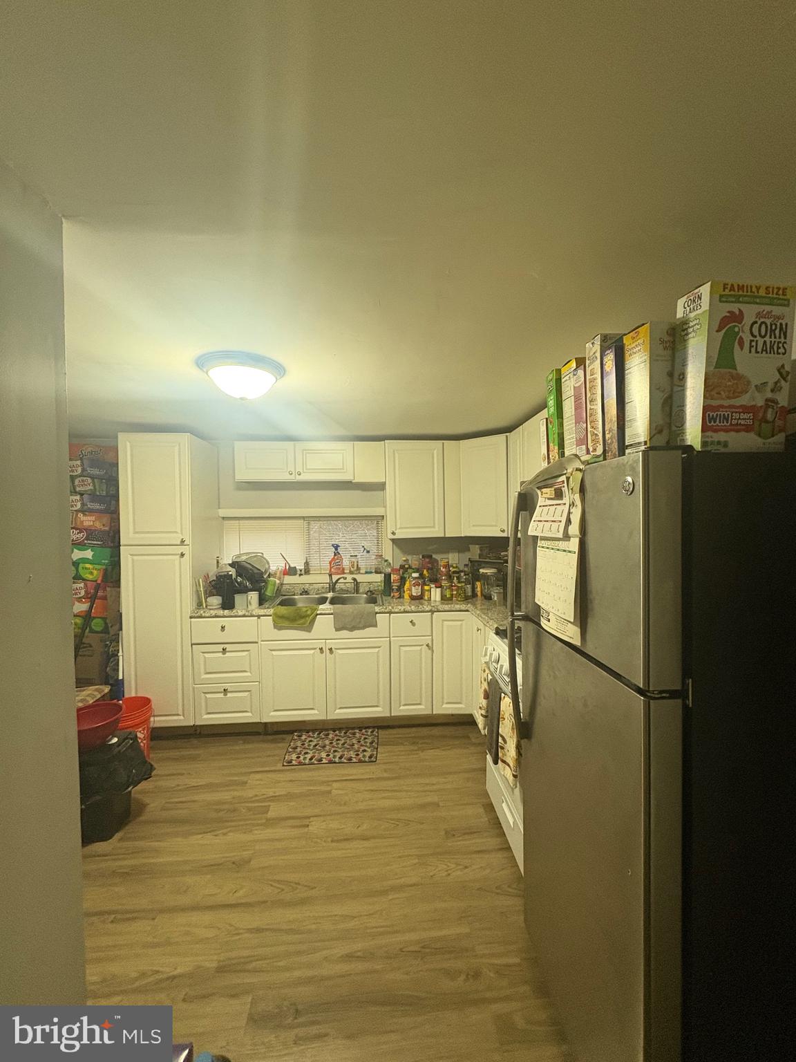 120 Doe Run Road Coatesville, PA 19320 - Photo 10 of 24 a kitchen with stainless steel appliances a refrigerator and a cabinets