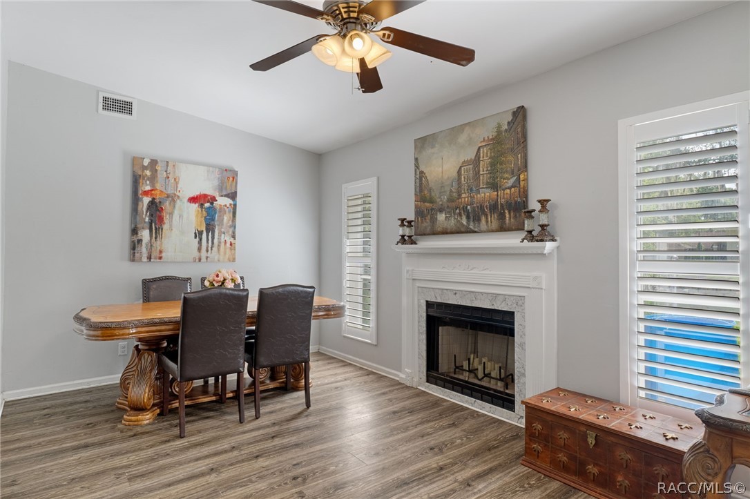 1140 South Highlands Avenue Inverness, FL 34452 - Photo 19 of 54 a living room with furniture and a fireplace