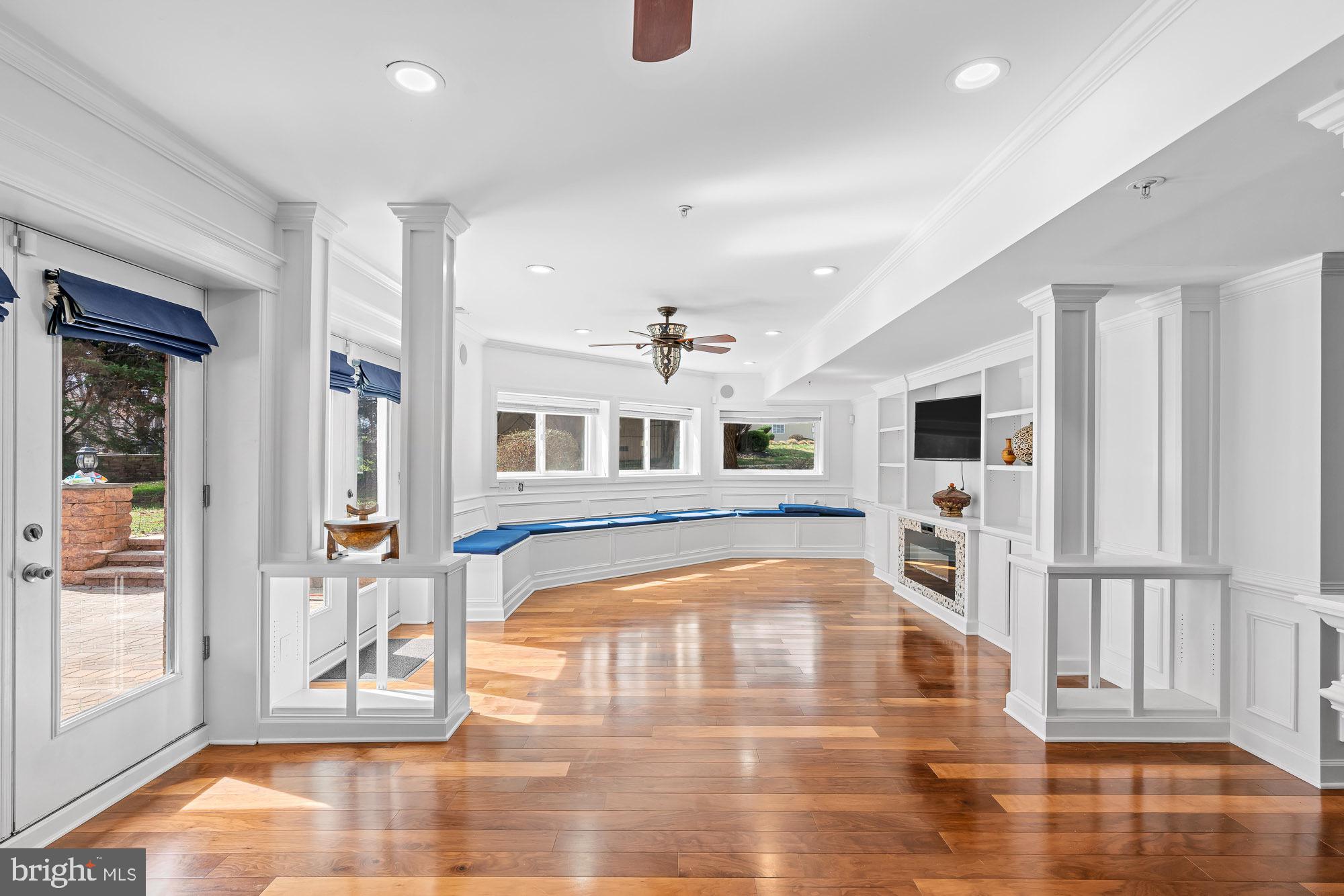 712 Swan Creek Road Fort Washington, MD 20744 - Photo 21 of 73 a view of a living room and kitchen view with wooden floor