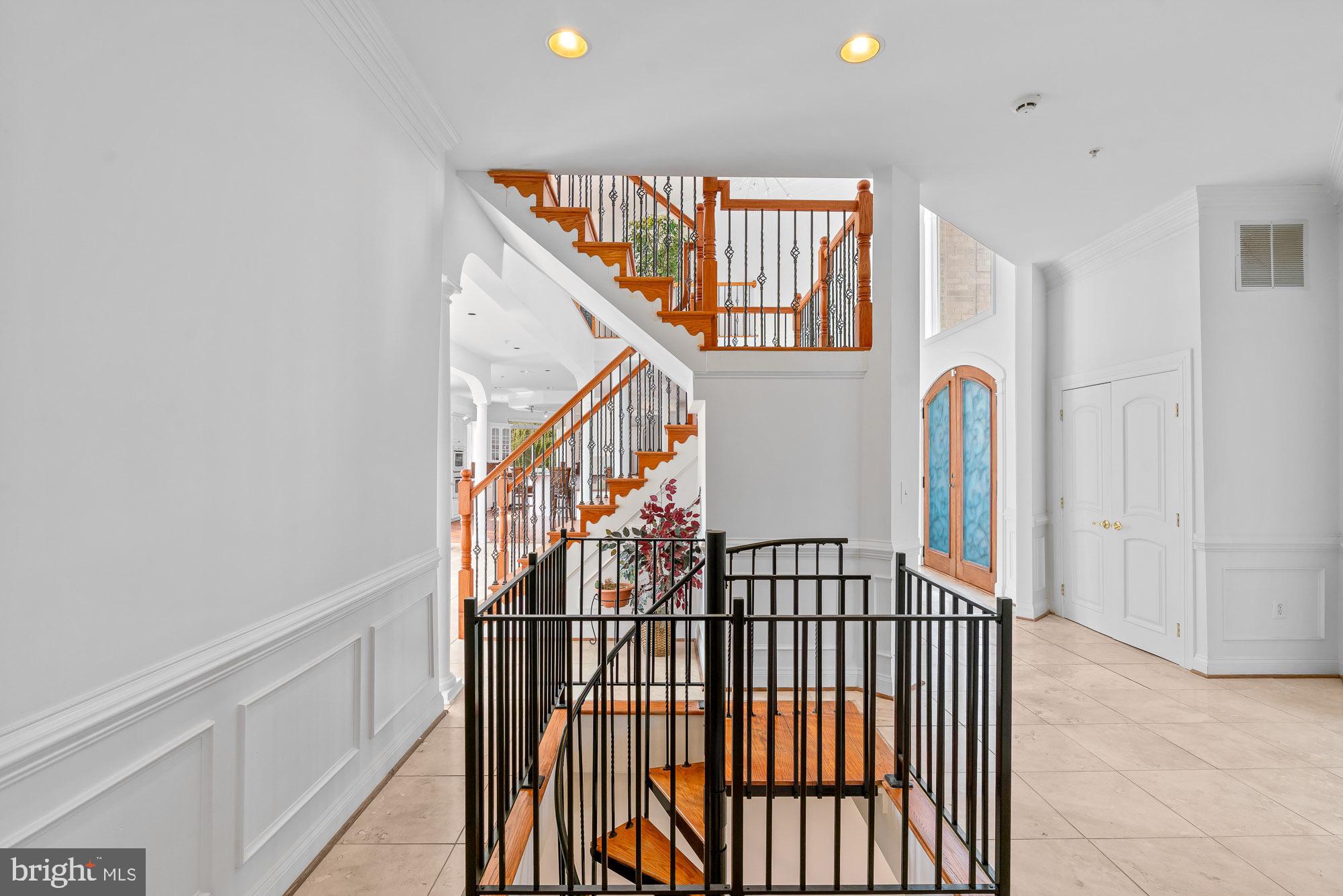 712 Swan Creek Road Fort Washington, MD 20744 - Photo 59 of 73 main level entrance stair case channel to upstairs