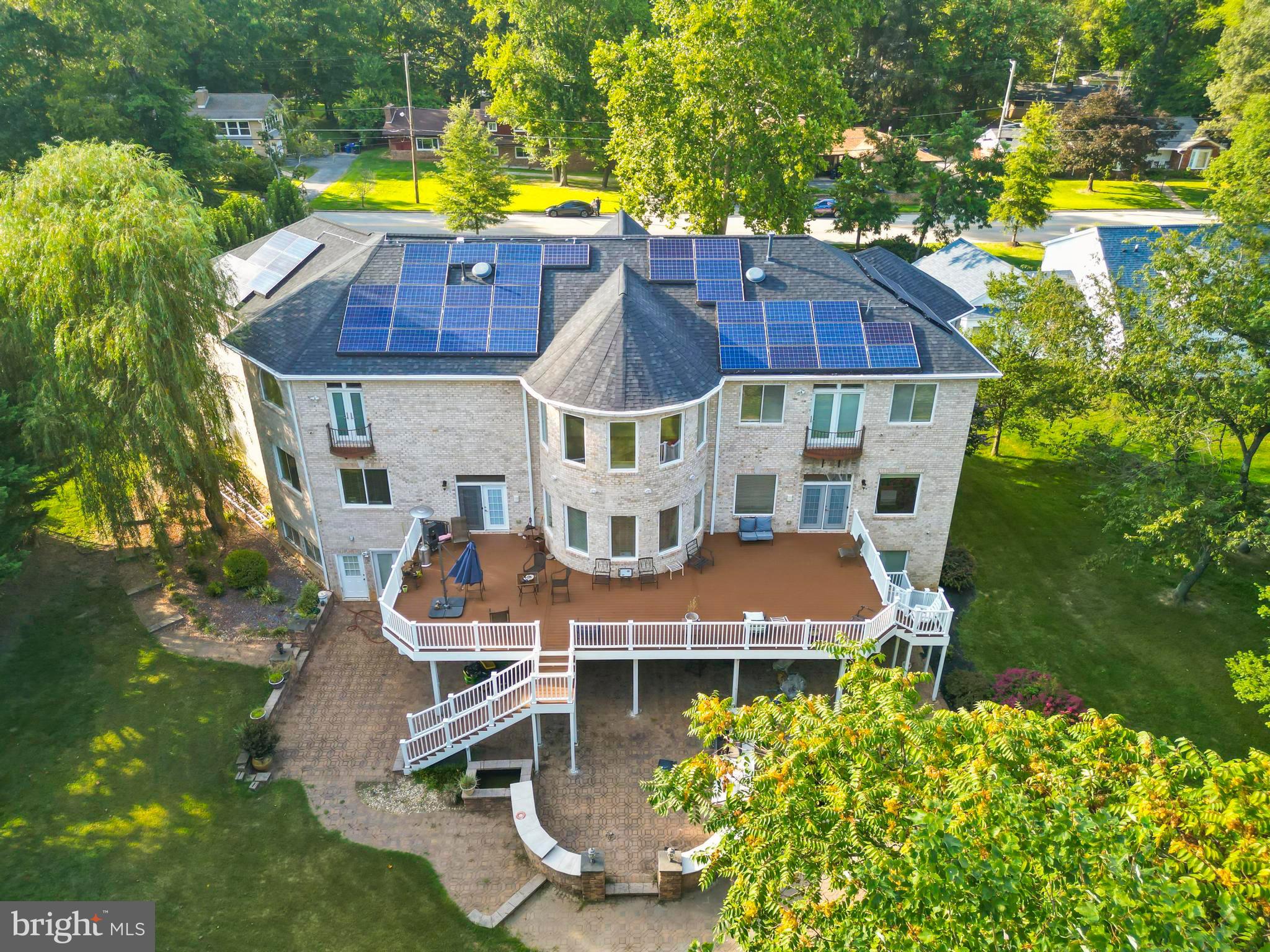 712 Swan Creek Road Fort Washington, MD 20744 - Photo 6 of 73 an aerial view of a house with swimming pool and large trees