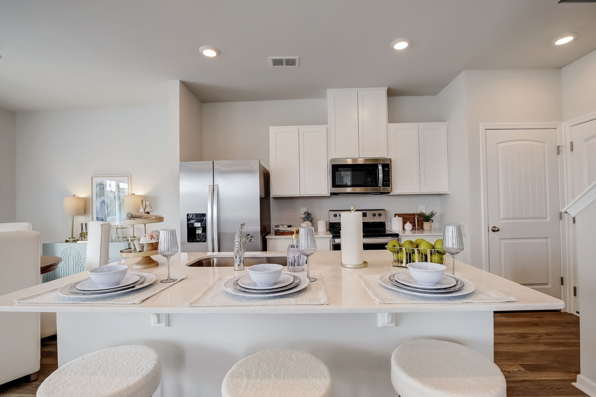2105 Widgeon Point Lebanon, TN 37090 - Photo 15 of 42 a kitchen with stainless steel appliances kitchen island granite countertop a sink and chairs