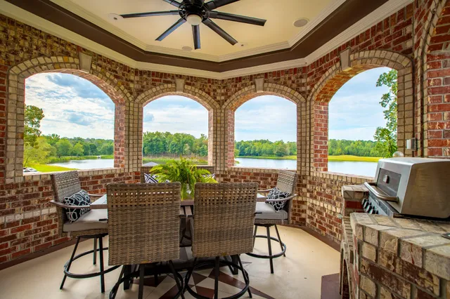 a view of living room with furniture and wooden floor