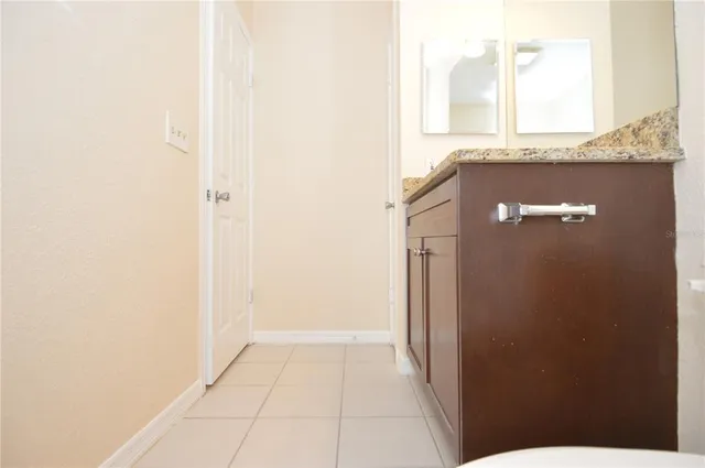 an empty room with a bathroom