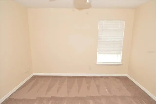 a view of a apartment with a big yard