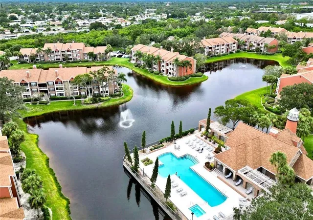 a sign that is in front of flowers