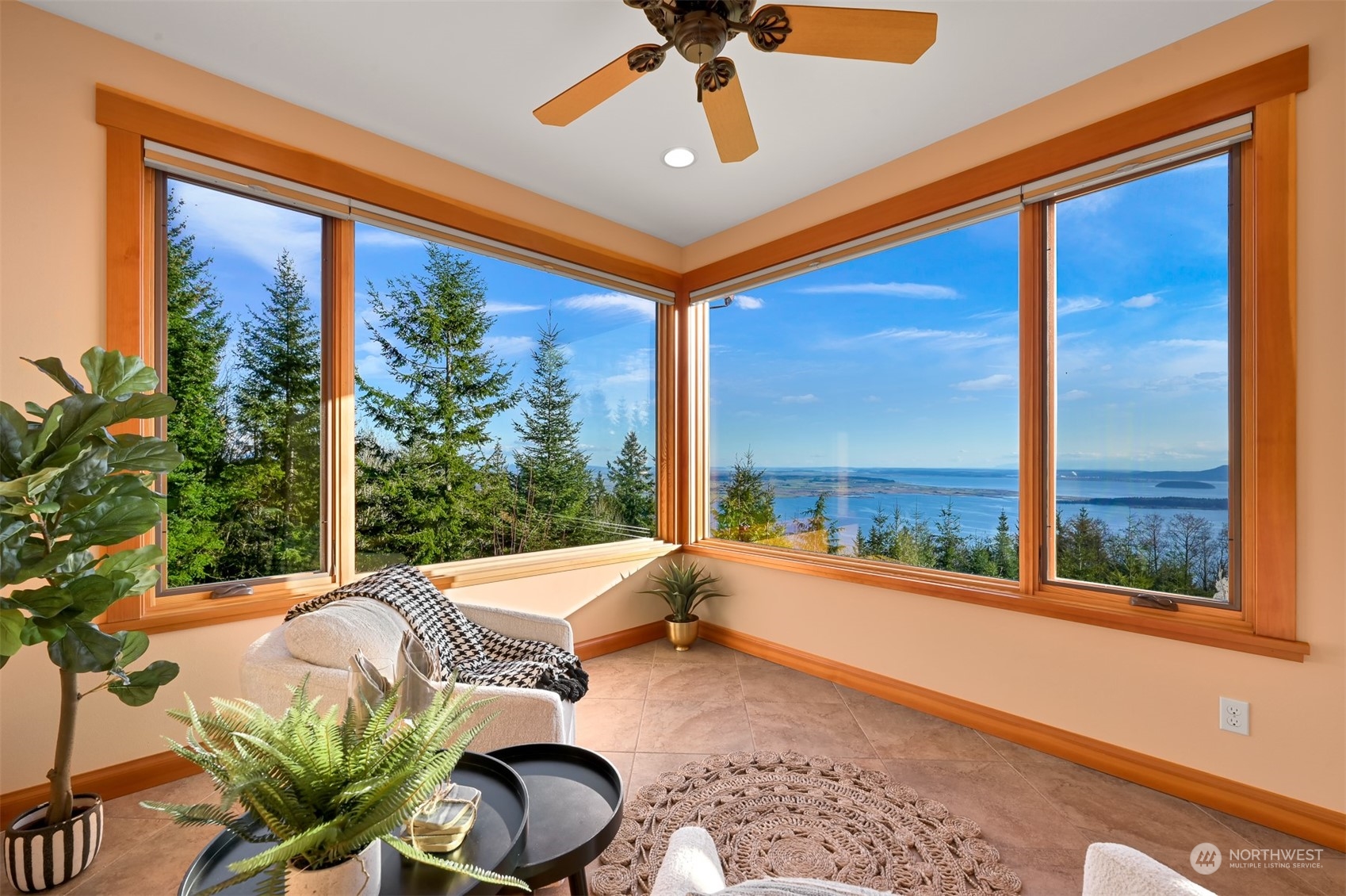 887 Chuckanut Ridge Drive Bow, WA 98232 - Photo 16 of 35 a bedroom with furniture and large windows