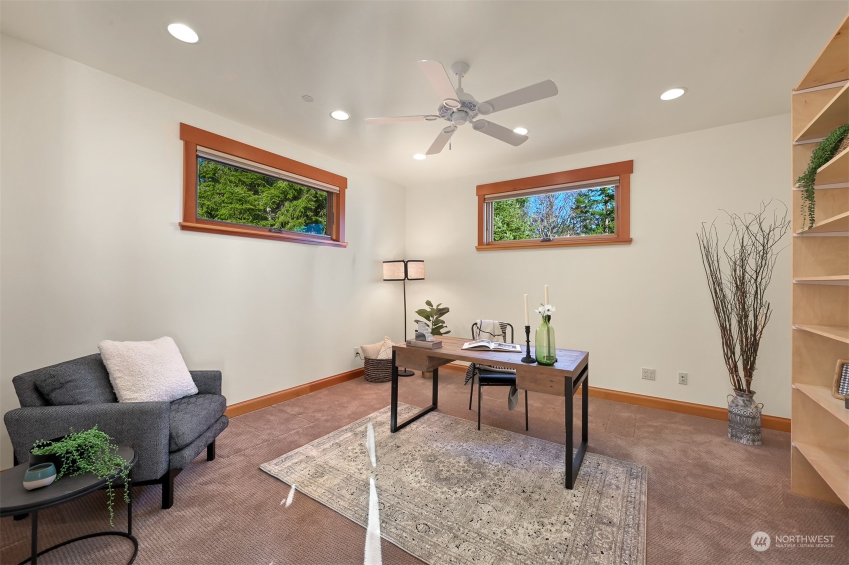 887 Chuckanut Ridge Drive Bow, WA 98232 - Photo 17 of 35 a work room with furniture and wooden floor