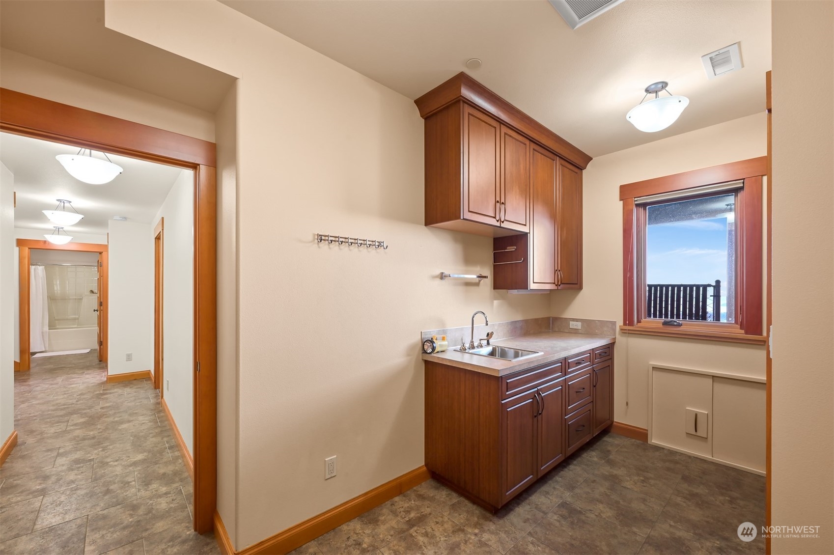 887 Chuckanut Ridge Drive Bow, WA 98232 - Photo 21 of 35 a kitchen with stainless steel appliances granite countertop a stove a sink and a refrigerator