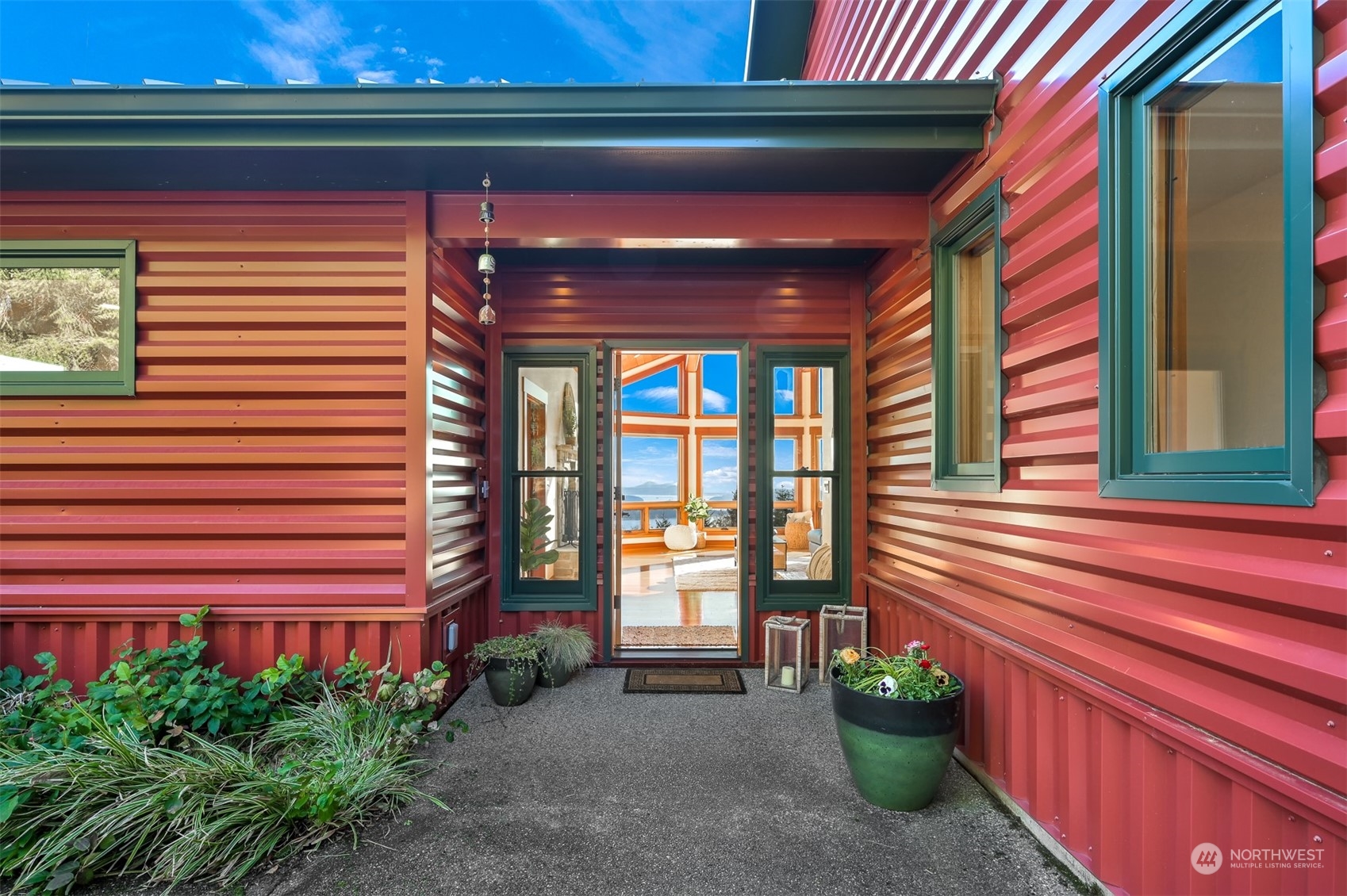 887 Chuckanut Ridge Drive Bow, WA 98232 - Photo 23 of 35 a view of a porch with a bench