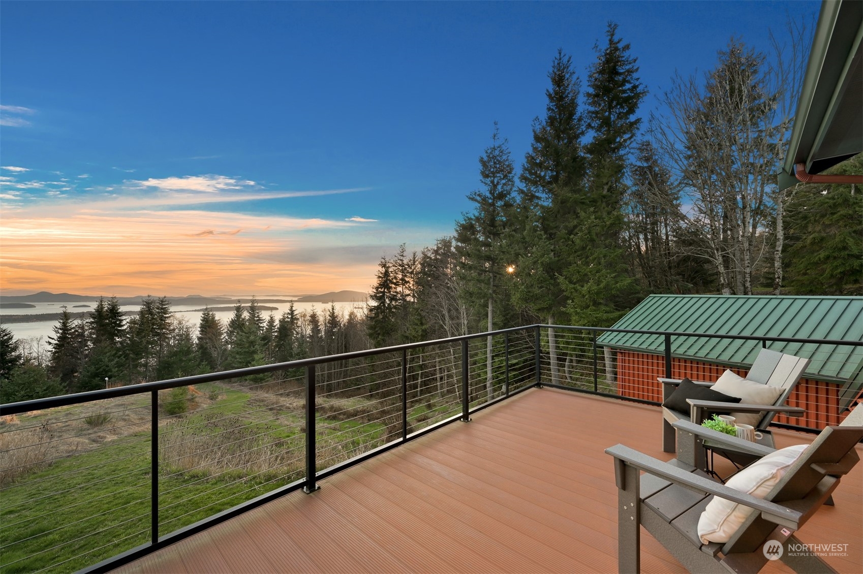 887 Chuckanut Ridge Drive Bow, WA 98232 - Photo 35 of 35 a view of a roof deck with wooden floor and fence