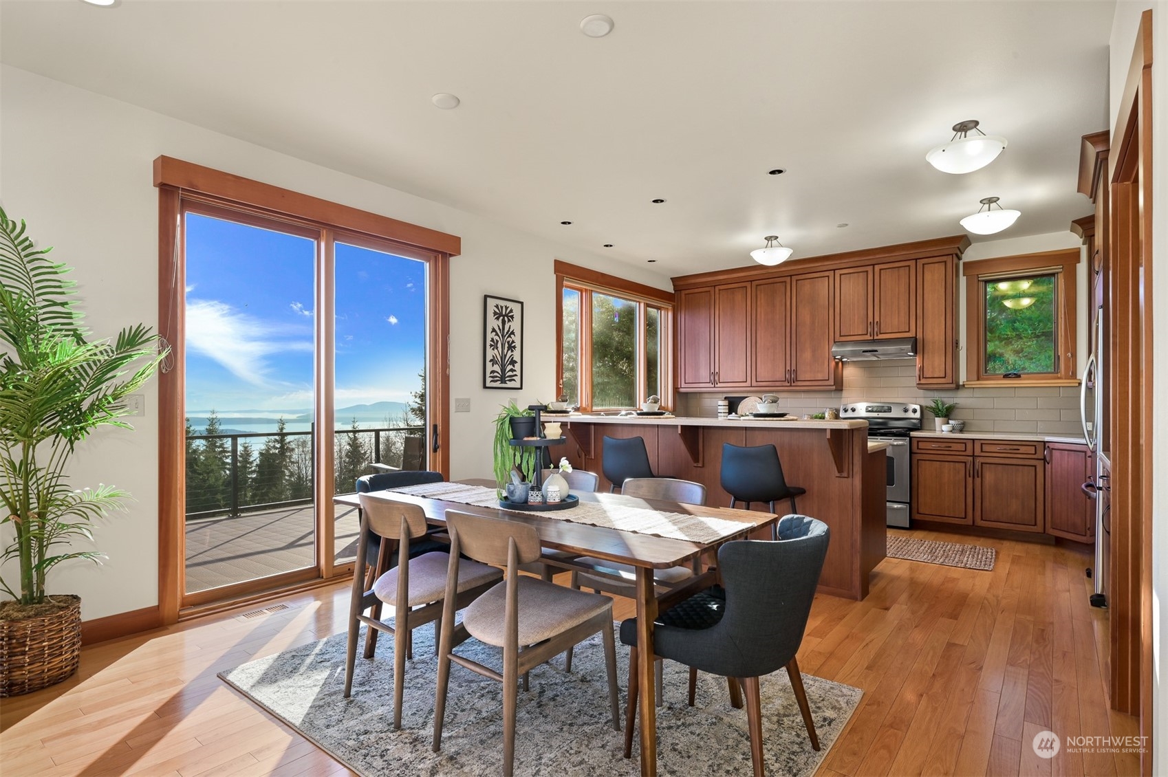 887 Chuckanut Ridge Drive Bow, WA 98232 - Photo 8 of 35 a view of a dining room with furniture window and wooden floor