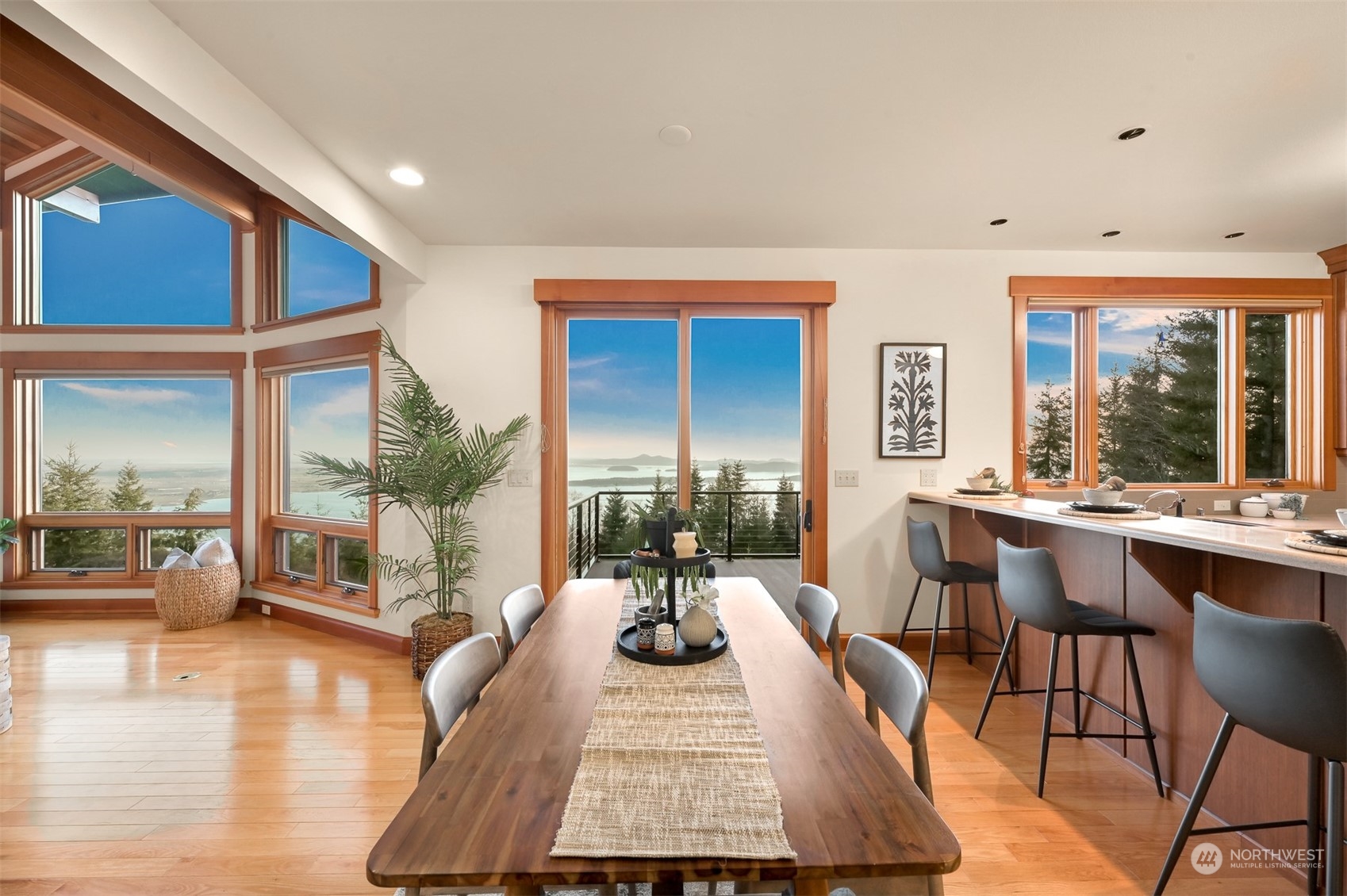 887 Chuckanut Ridge Drive Bow, WA 98232 - Photo 9 of 35 a view of a dining room with furniture window and wooden floor