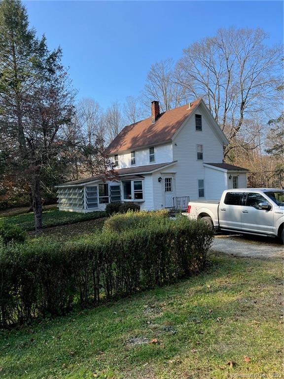 a view of a house with a garden