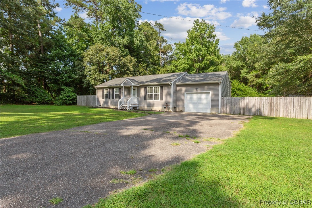 7989 Pinetta Road Gloucester, VA 23061 - Photo 26 of 26 Ranch-style house with an attached garage and driveway