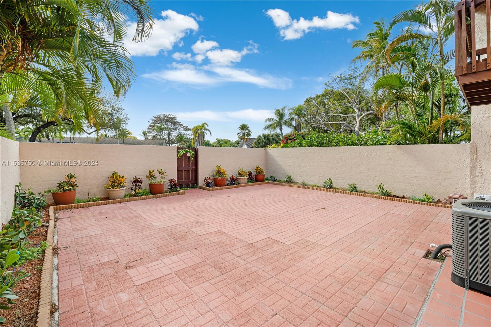 13225 Southwest 95th Avenue, Unit 13225 Miami, FL 33176 - Photo 13 of 36 a view of outdoor space and yard