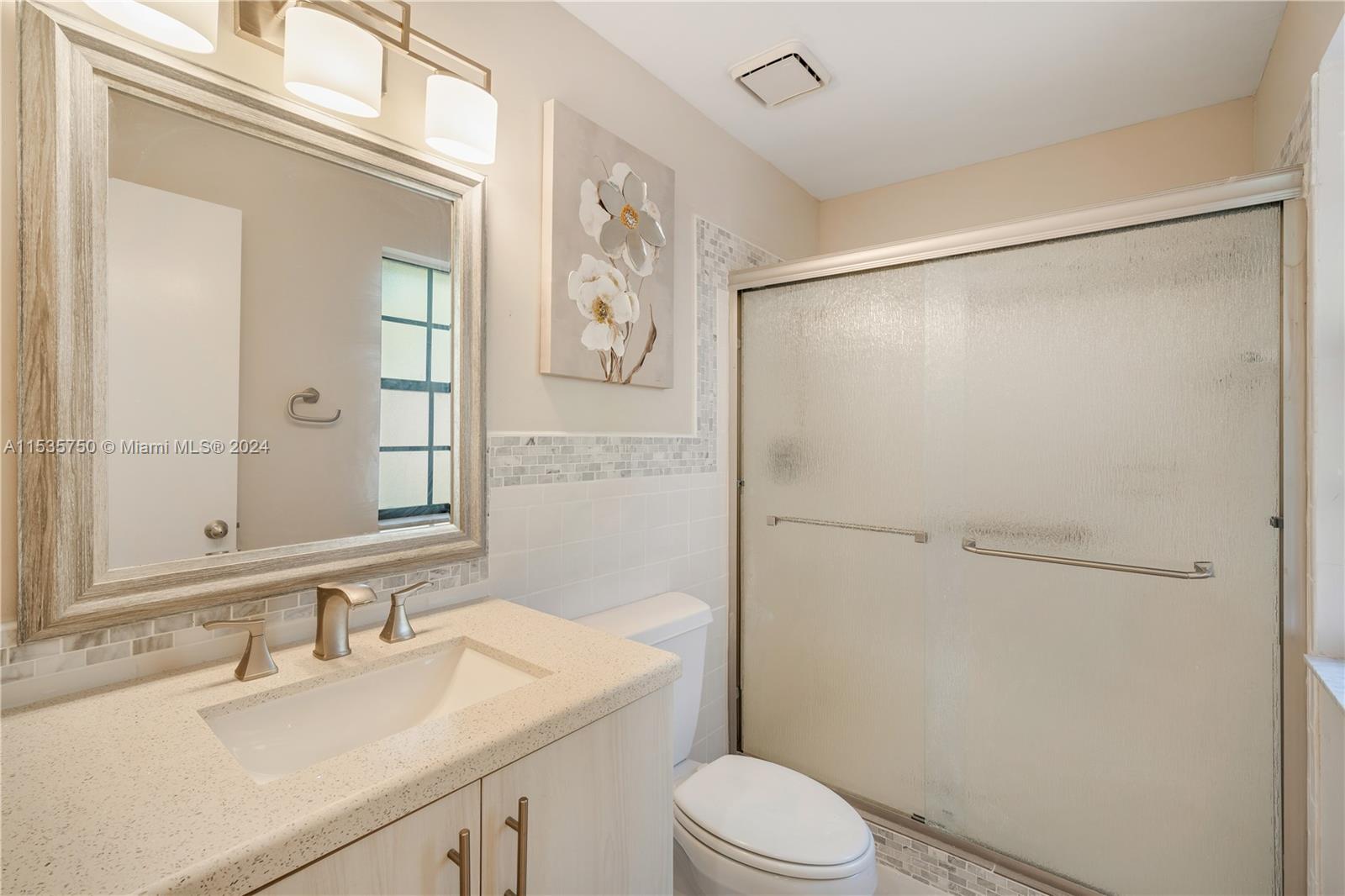 13225 Southwest 95th Avenue, Unit 13225 Miami, FL 33176 - Photo 20 of 36 a bathroom with a sink a toilet and shower