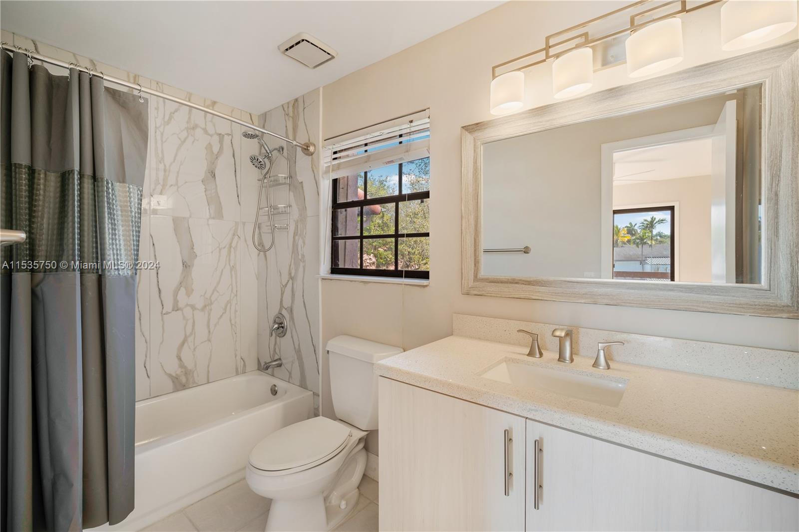 13225 Southwest 95th Avenue, Unit 13225 Miami, FL 33176 - Photo 22 of 36 a bathroom with a sink toilet and shower