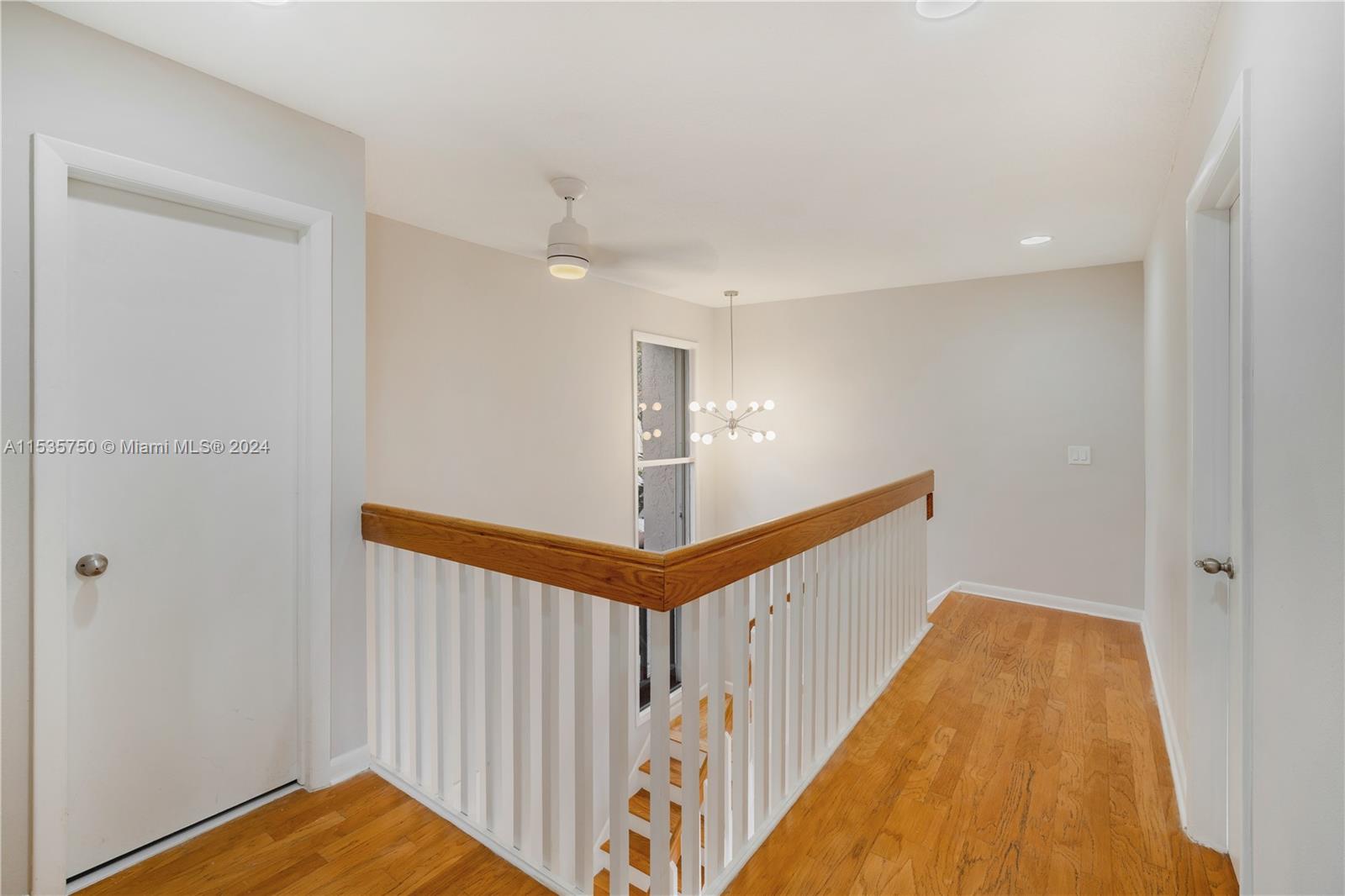 13225 Southwest 95th Avenue, Unit 13225 Miami, FL 33176 - Photo 28 of 36 a view of a hallway view with staircase
